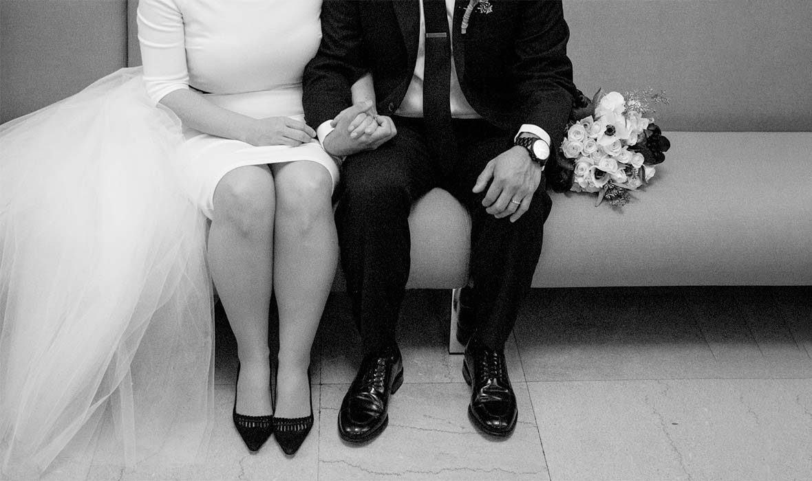 Elopement couple, bride in ivory tulle overskirt with black waistband by the lotus bloom co.