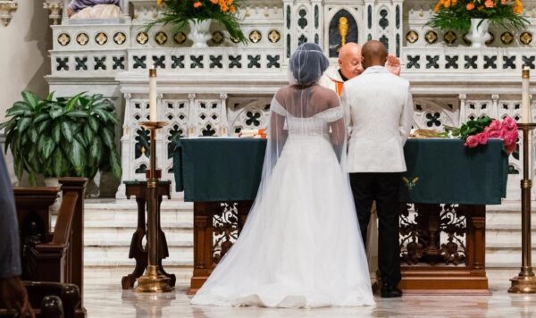 Wedding couple, bride in ivory hooded tulle cape by the lotus bloom co.