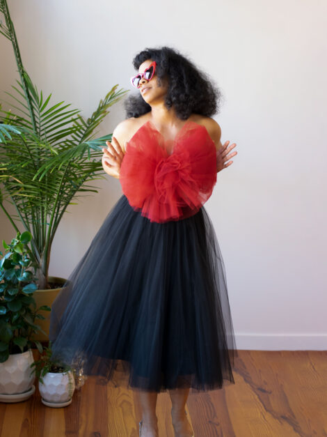 Black tea-length tulle skirt with red tulle top by the lotus bloom co.