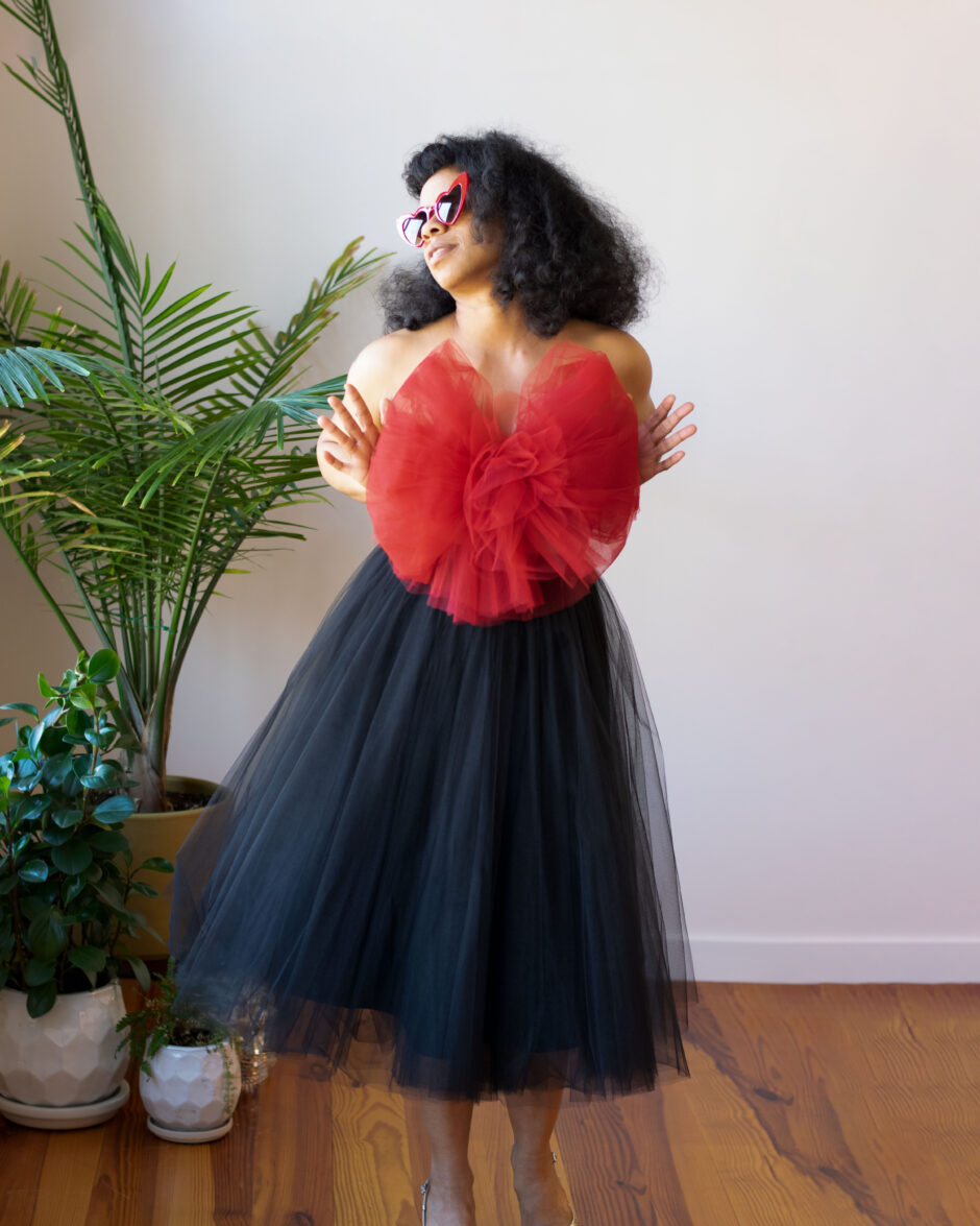 Black tea-length tulle skirt with red tulle top by the lotus bloom co.