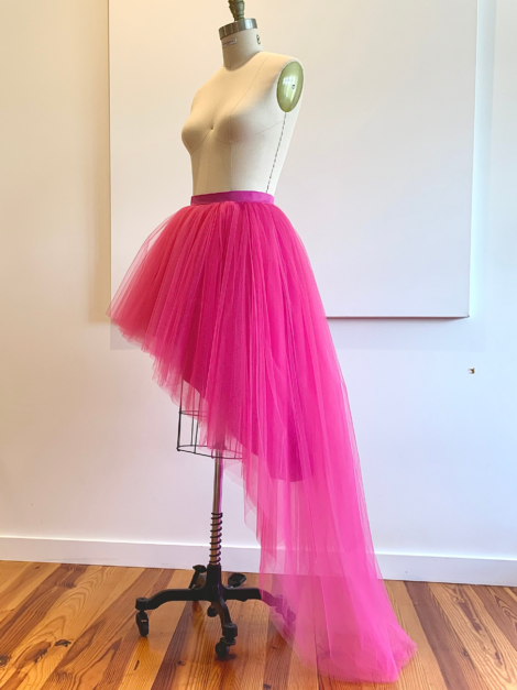 Dress form with fuchsia pink asymmetrical tulle skirt by the lotus bloom co